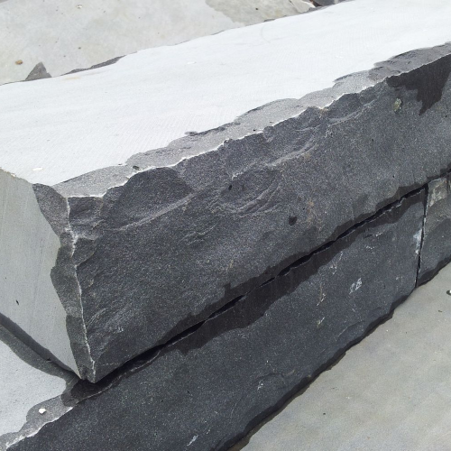 Quy Nhon Basalt Wall bricks, front and back sides cleaved with reworked edges, other sides sawn.