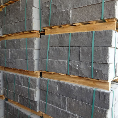Quy Nhon Basalt Wall bricks, front and back sides cleaved with reworked edges, other sides sawn.