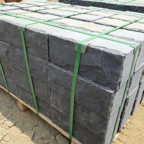 Quy Nhon Basalt Wall bricks, front and back sides cleaved with reworked edges, other sides sawn.