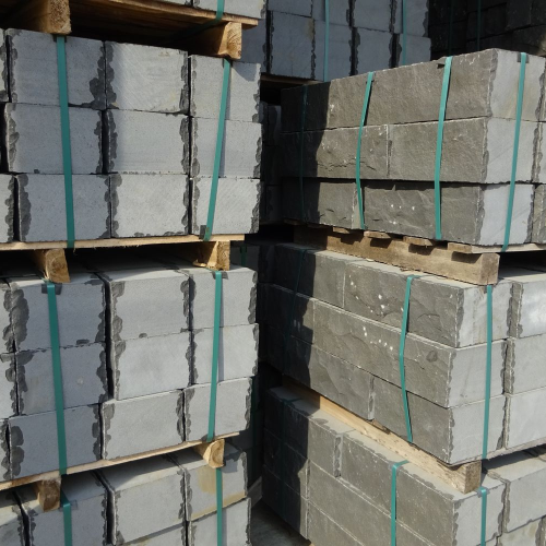 Quy Nhon Basalt Wall bricks, front and back sides cleaved with reworked edges, other sides sawn.