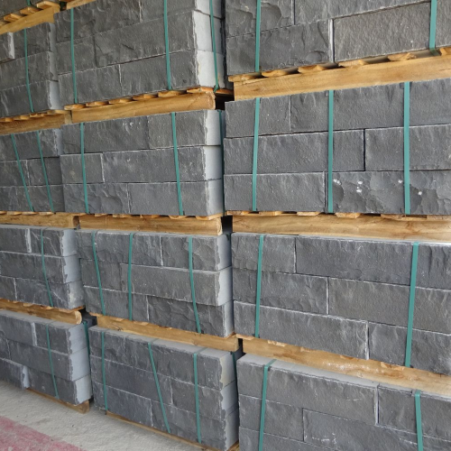 Quy Nhon Basalt Wall bricks, front and back sides cleaved with reworked edges, other sides sawn.