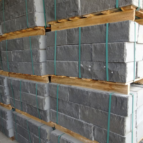 Quy Nhon Basalt Wall bricks, front and back sides cleaved with reworked edges, other sides sawn.